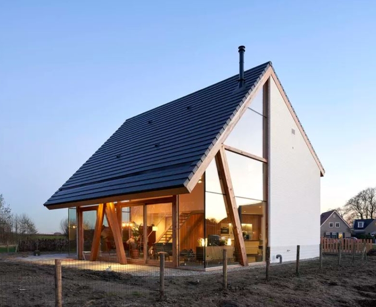 Modern barn is half transparent, half concealed