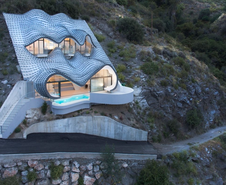 Unique Home Looks Like a Dragon Emerging From Cliffside