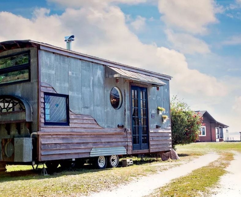 Dream tiny house comes with a pizza oven fireplace