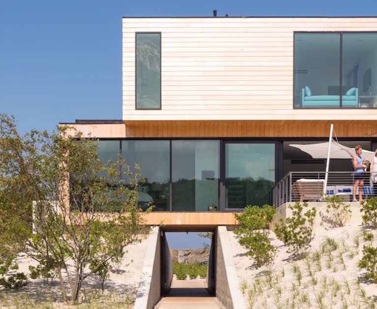 Coastal beach house raised above dunes