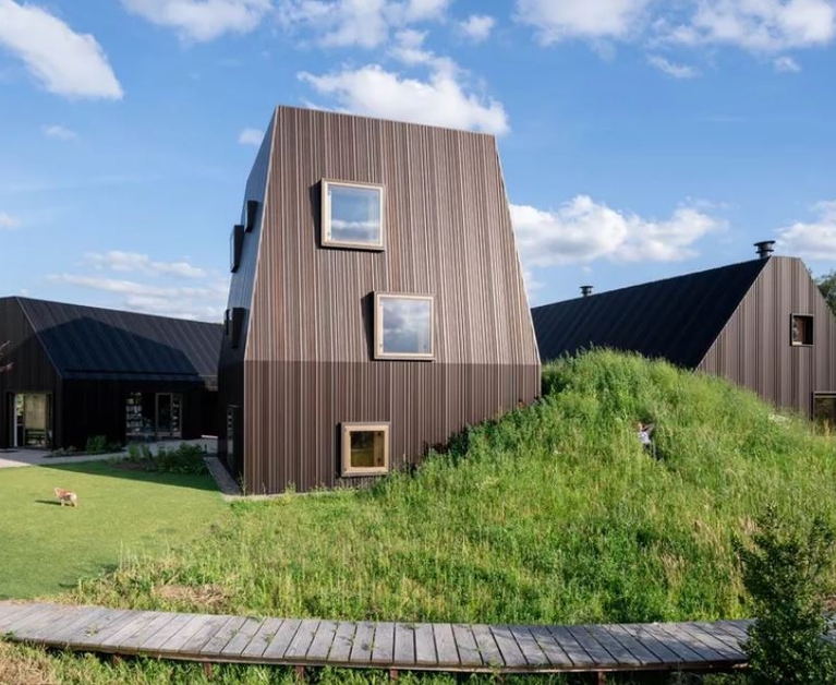 Dutch farmhouse designed to resemble a small village